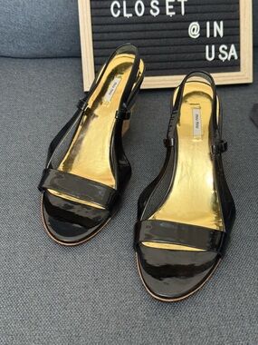 Miu Miu  patent leather wedges (2026 trend)